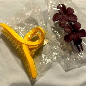 Hair clips 2 beautiful clips 1 yellow, 1 purple NWOT